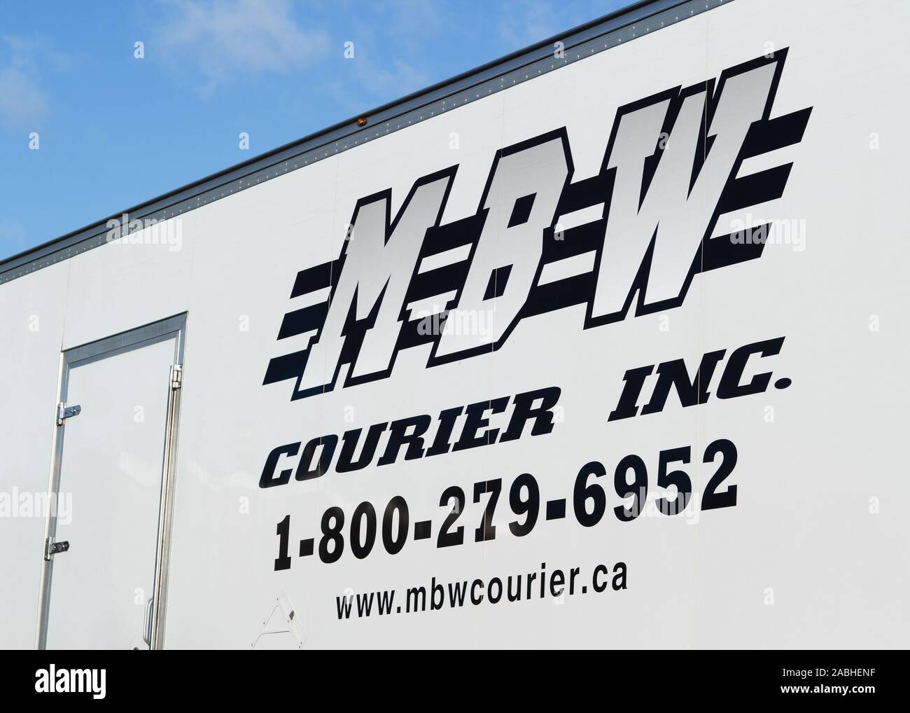 Truro, Canada - November 27, 2019: MBW Courier delivery truck trailer. MBW is a Canadian courier company operating in Atlantic Canada. Stock Photo