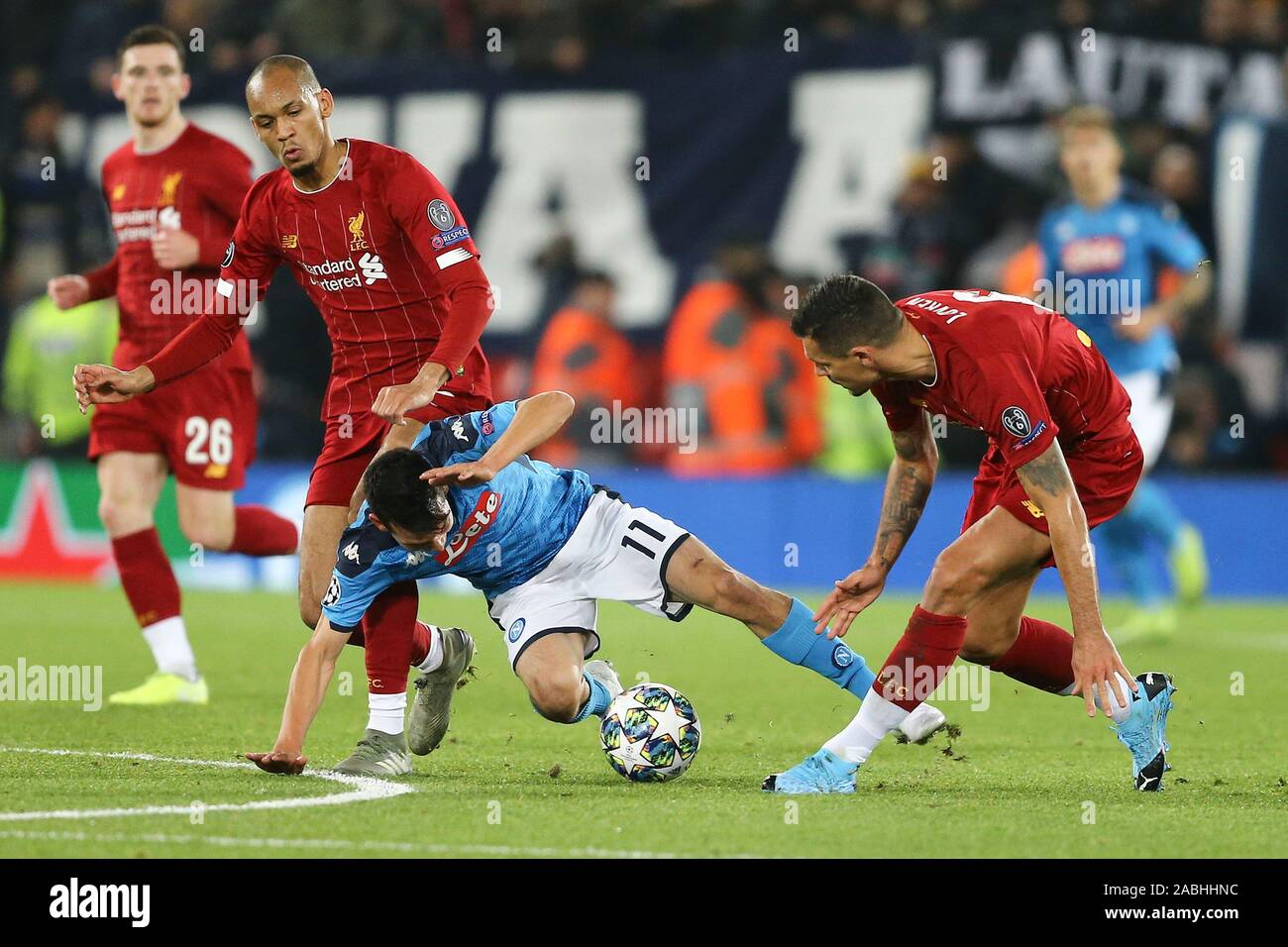 Liverpool Uk 27th Nov 19 Allan Of Napoli Looks To Go Between Fabinho L And Dejan Lovren Of Liverpool But Is Brought Down Uefa Champions League Group E Match Liverpool V Napoli
