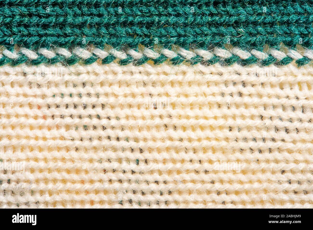 Green and white knitting wool texture. Cloth background close up Stock ...
