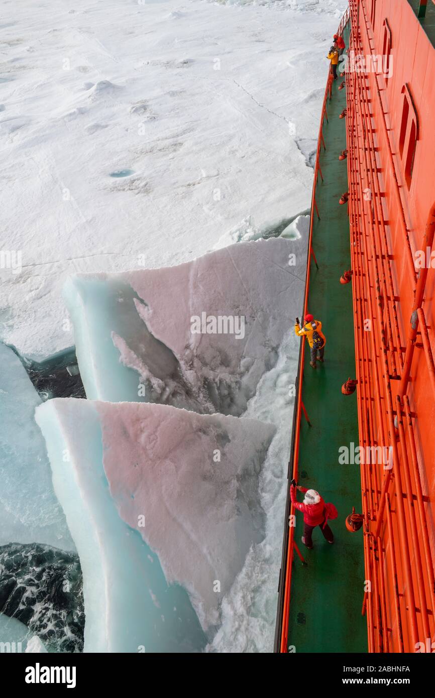 Russia, High Arctic. Crashing through thick sea ice at 89 degrees north as seen from the deck of Russian icebreaker, 50 Years of Victory. Stock Photo