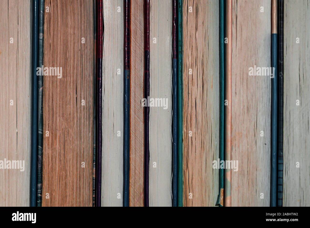 old books on a shelf in the library Stock Photo - Alamy