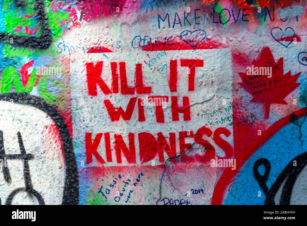 Kill it with Kindness, colourful graffiti on the John Lennon Wall, Prague, Bohemia, Czech Republic Stock Photo