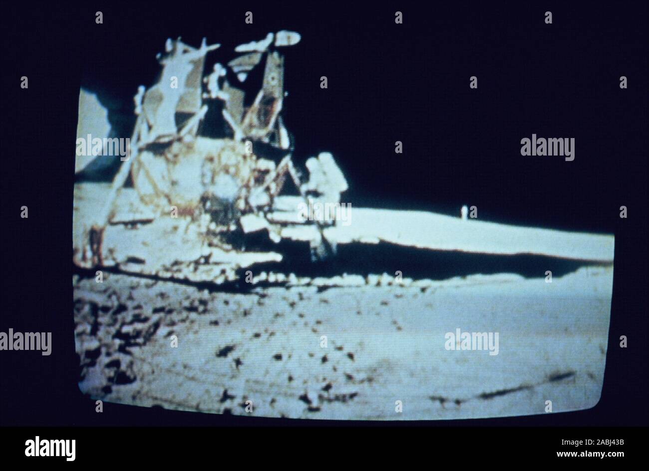 Teleclip - Apollo 11 Buzz Aldrin walking down ladder of Lunar Module – shot by Neil Armstrong - photo taken directly from TV screen circa 1969/72 Stock Photo