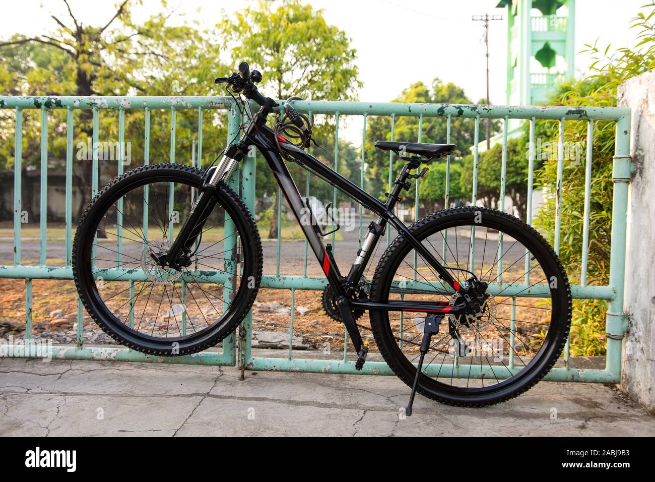 Bicycle Locked to a Fence-Security and Anti-Theft Stock Photo