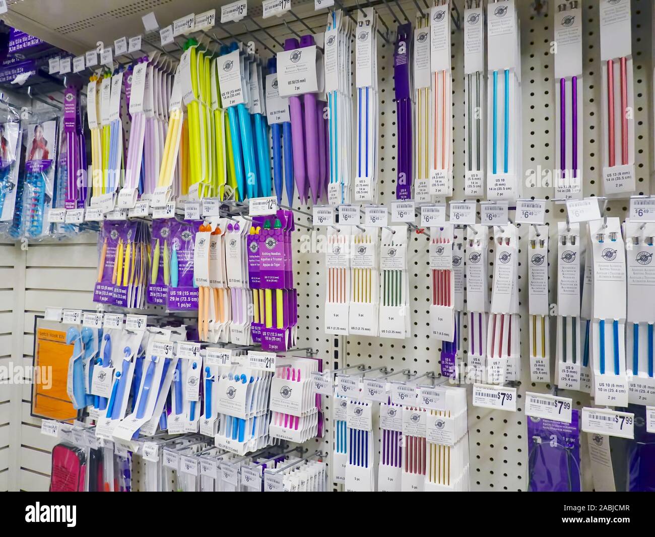Knitting Needles and Crochet Hooks on Display in a Craft Store. Stock Photo