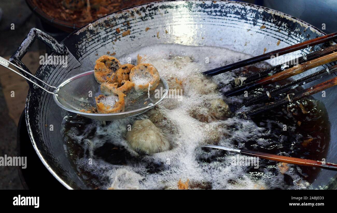 Fried Taro and Black Beans in pan Stock Photo - Alamy