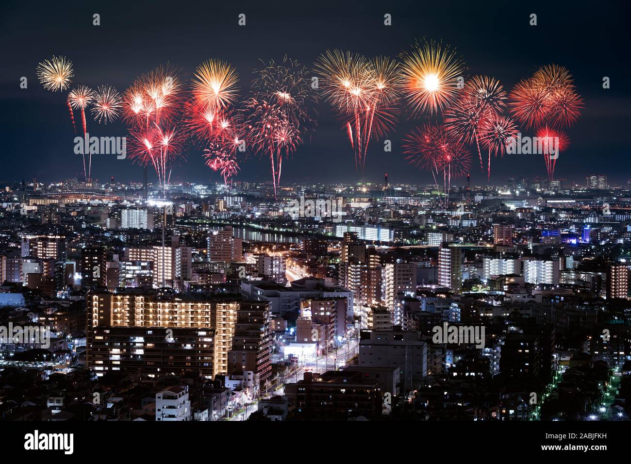 Fireworks celebrating over Tokyo cityscape at night, Japan Stock Photo ...