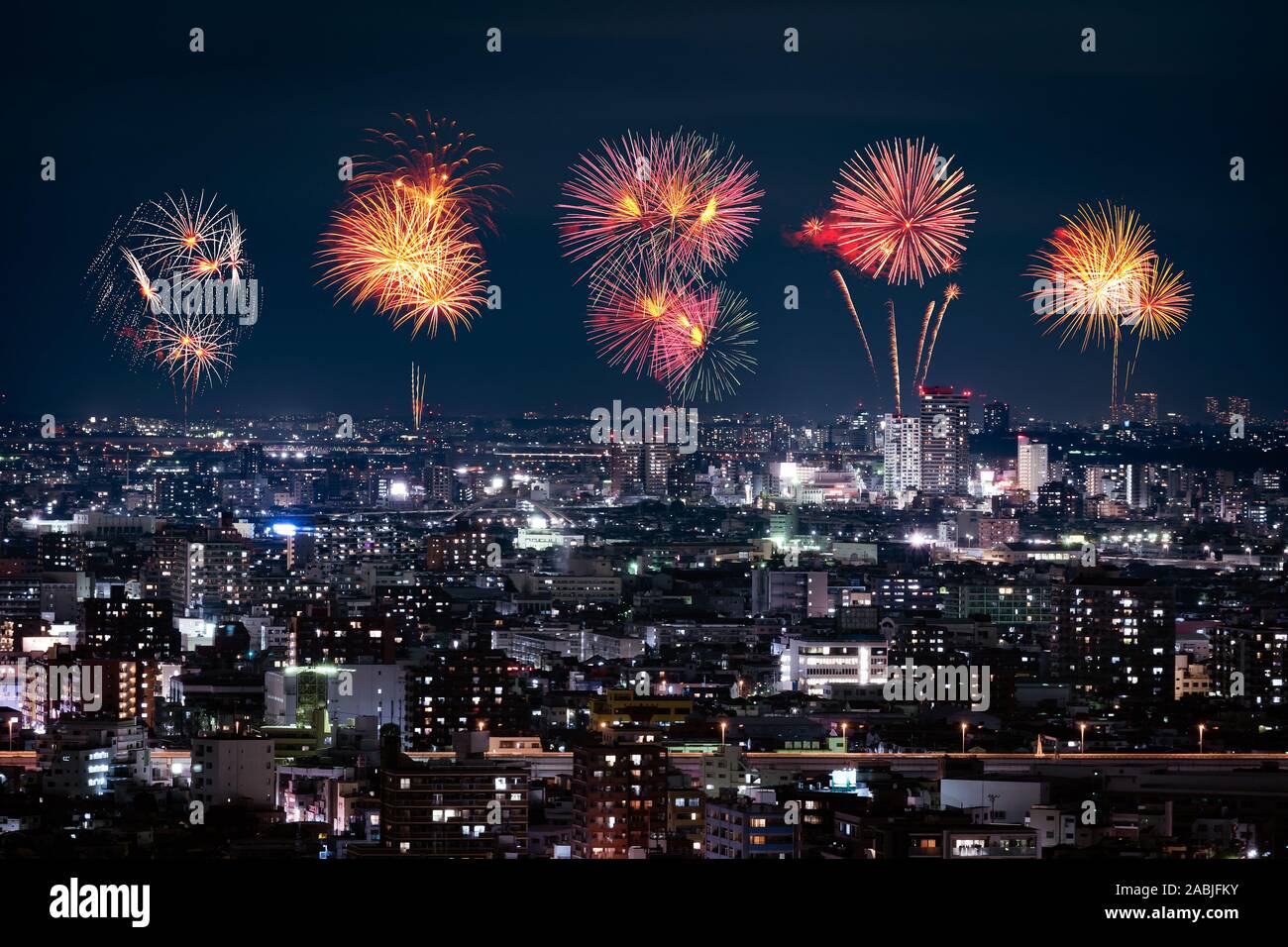 Fireworks celebrating over Tokyo cityscape at night, Japan Stock Photo ...