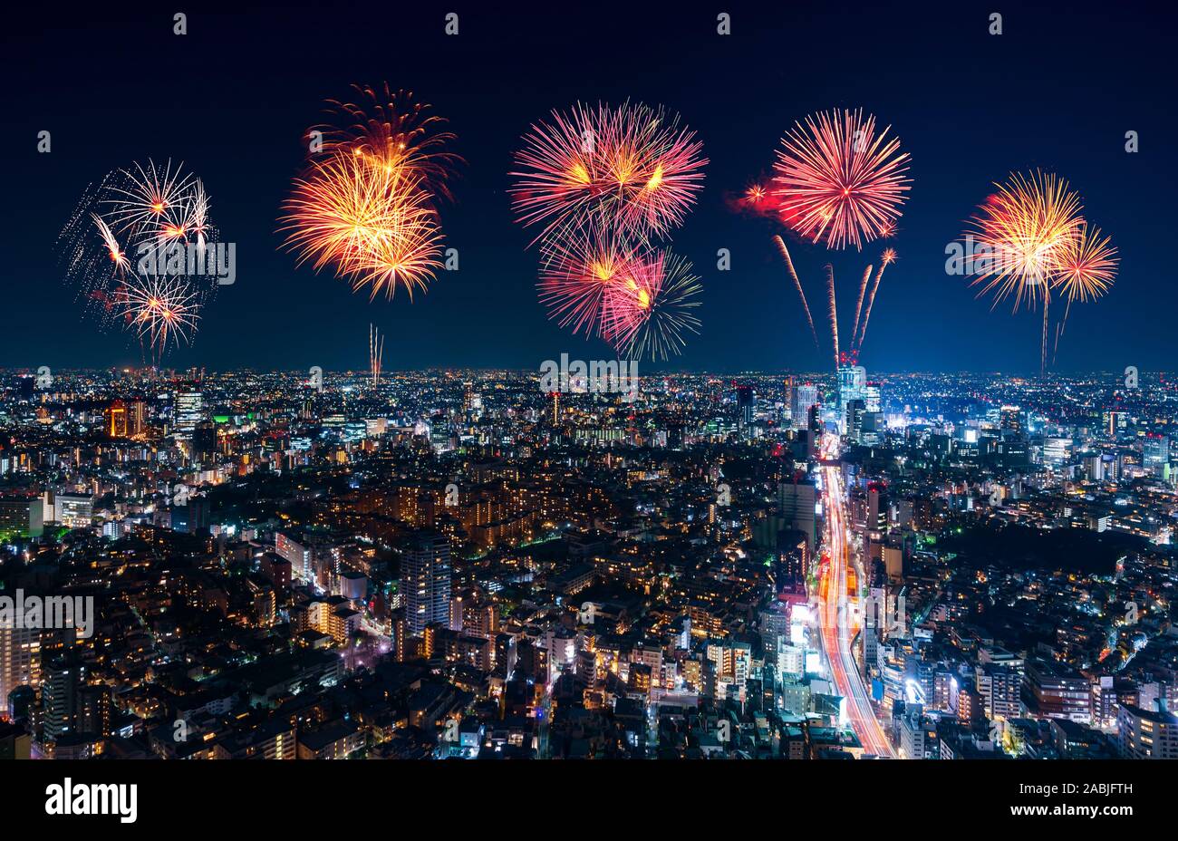 Fireworks celebrating over Tokyo cityscape at night, Japan Stock Photo ...