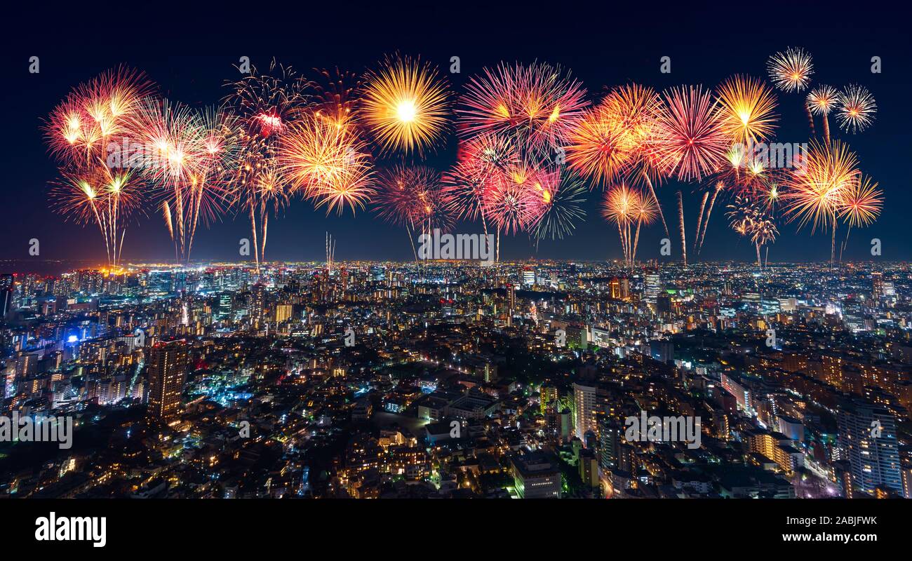 Fireworks celebrating over Tokyo cityscape at night, Japan Stock Photo ...