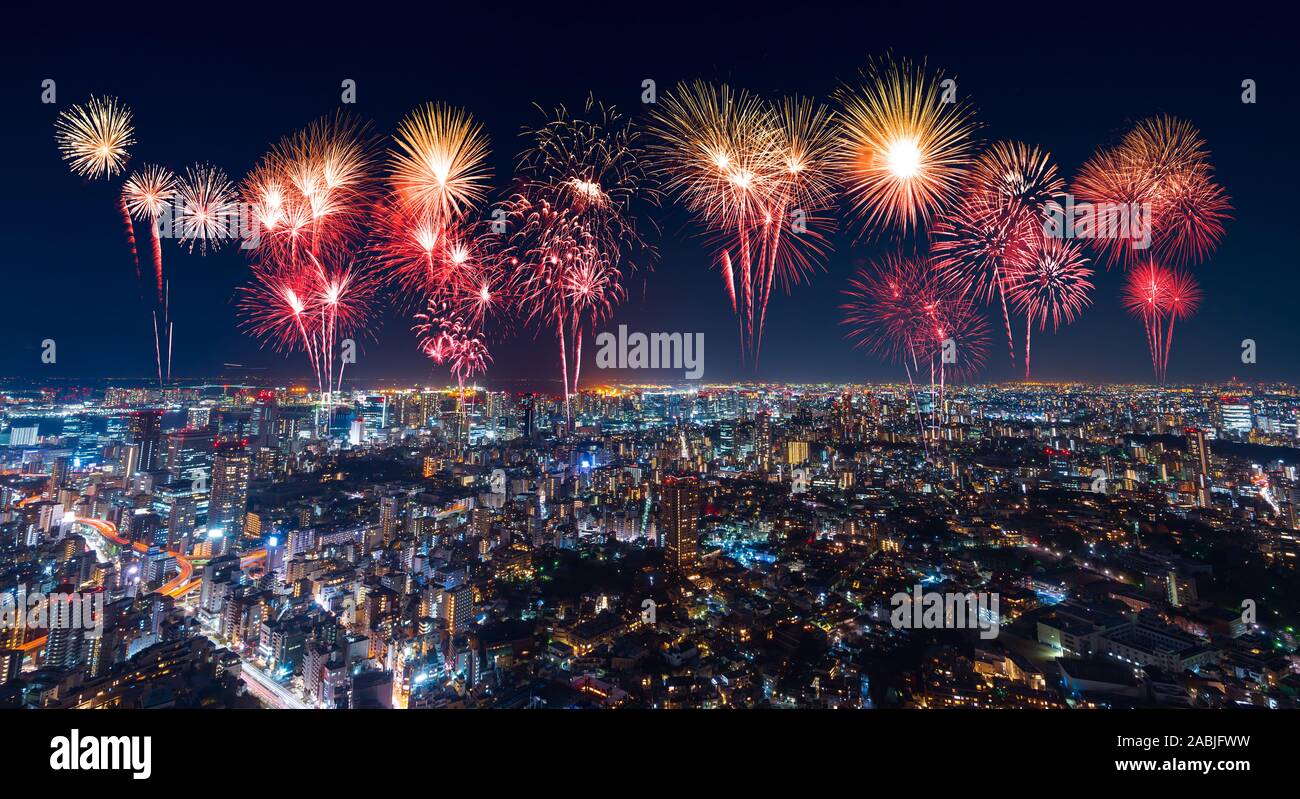 Fireworks celebrating over Tokyo cityscape at night, Japan Stock Photo ...