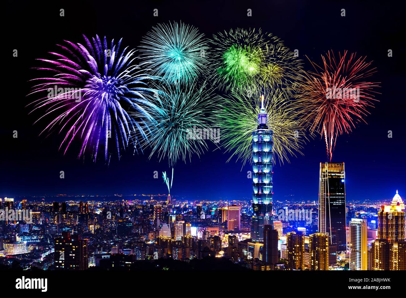 Fireworks celebrating over Taipei cityscape at night, Taiwan Stock