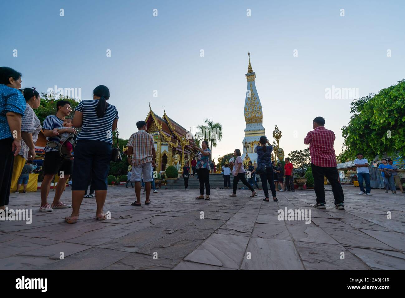 NAKHON PHANOM, THAILAND - OCTOBER 12, 2019: Unidentified people ceremony to worship at Wat Phra That phanom in Nakhon Phanom Province, Thailand Stock Photo