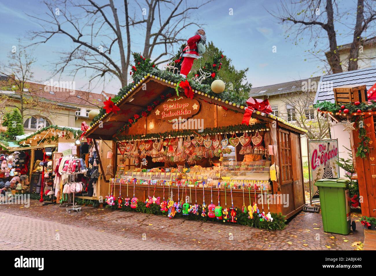 Heidelberg, Germany - November 2019: Sales booth selling colorful sweets during traditional Christmas market in Heidelberg city center Stock Photo