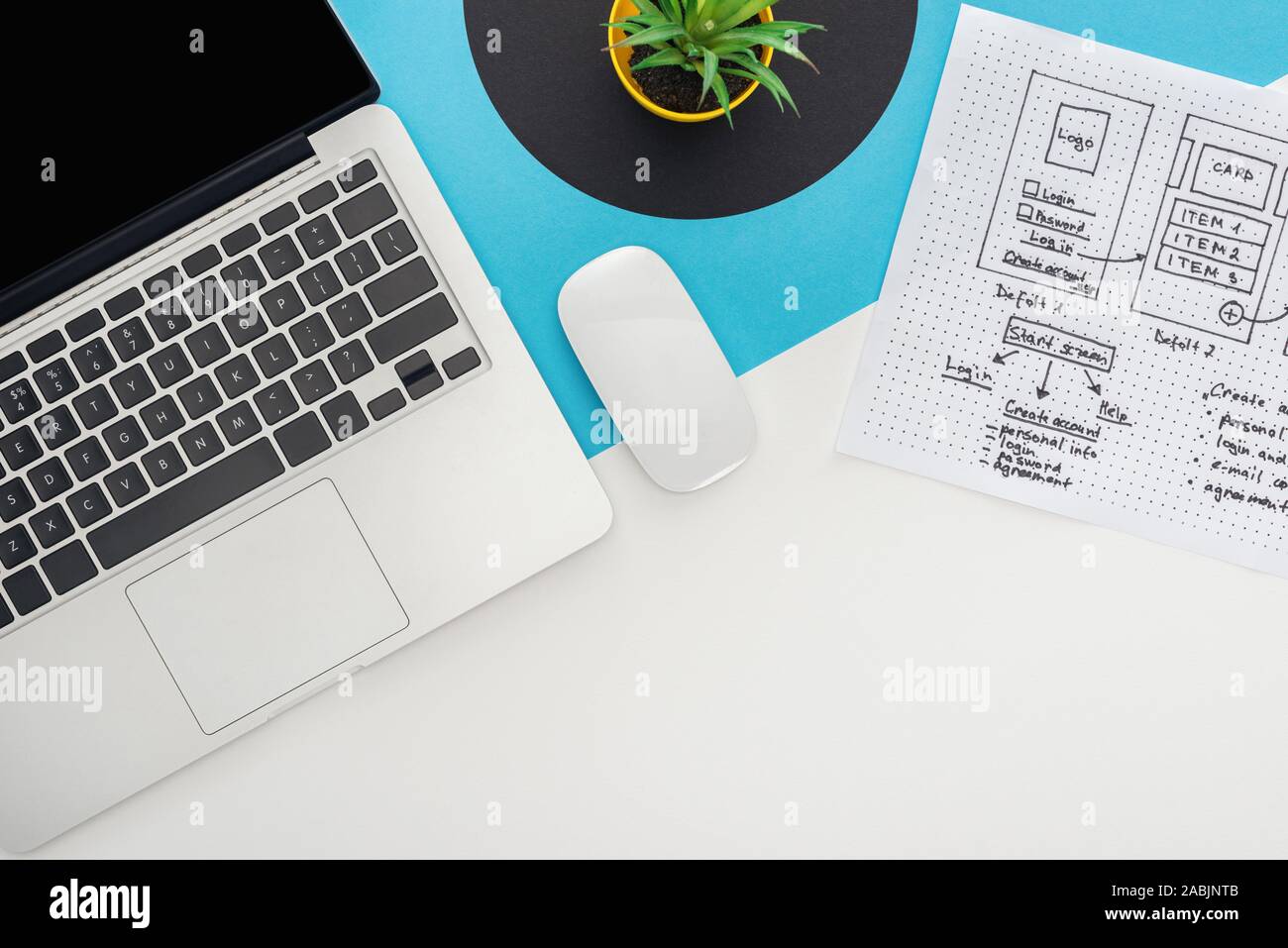 Top View Of Laptop Computer Mouse Plant Website Design Template On Abstract Geometric Background Stock Photo Alamy alamy