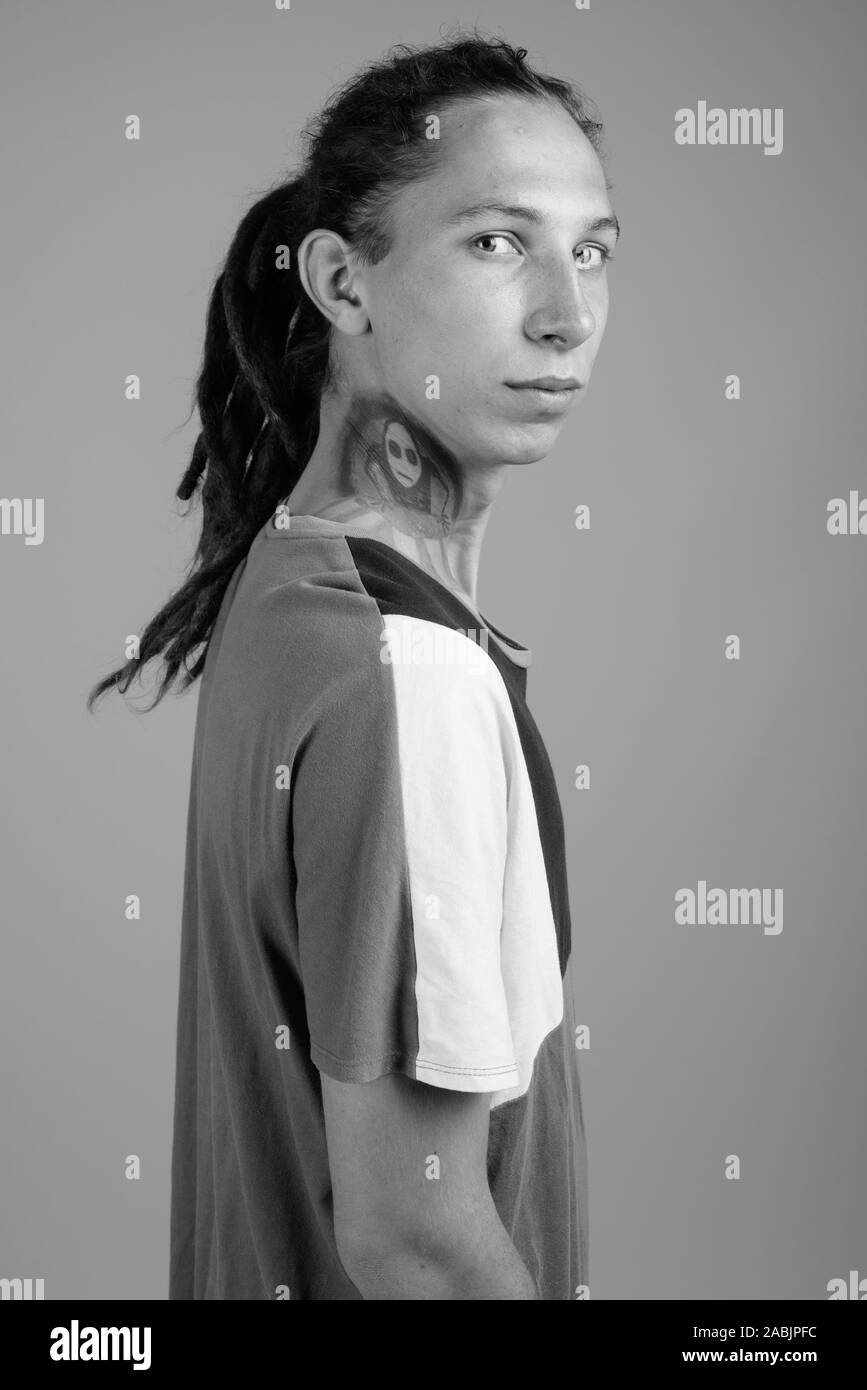 Young man with dreadlocks in black and white Stock Photo - Alamy