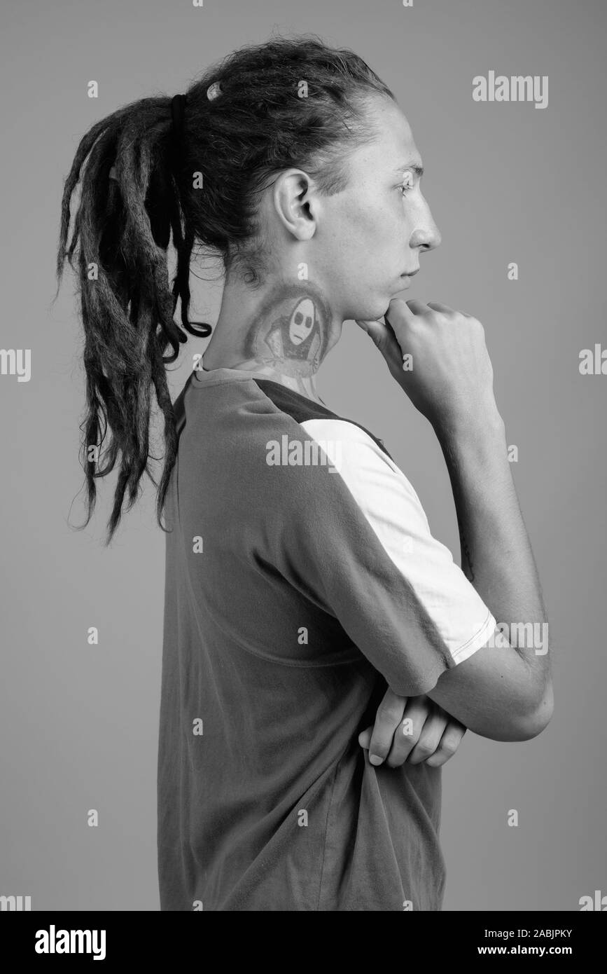 Young man with dreadlocks in black and white Stock Photo