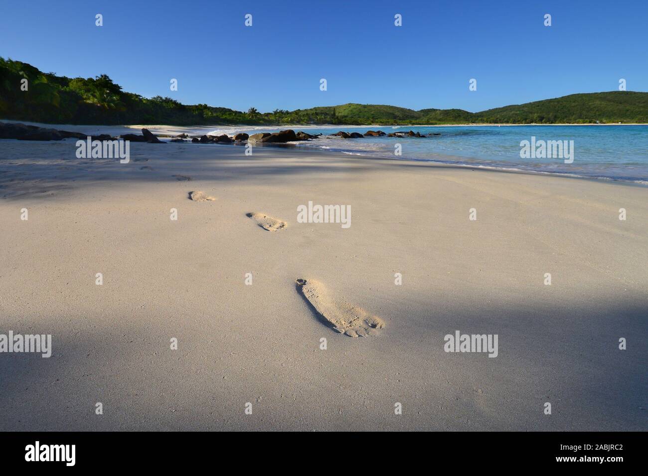 Human footprints at the tropical beach of Culebra. Puerto rico Stock Photo