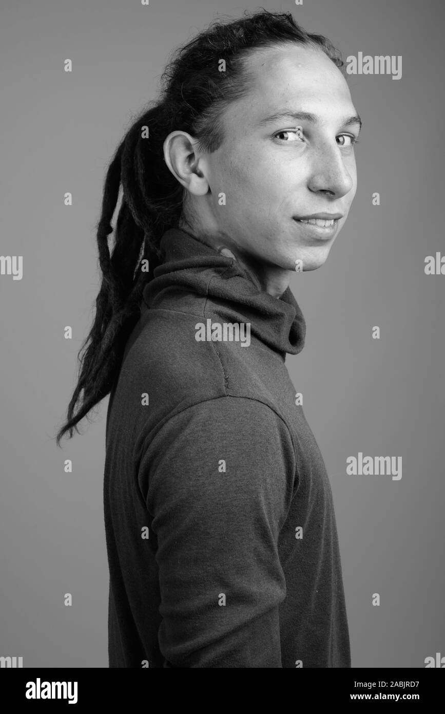Young man with dreadlocks in black and white Stock Photo - Alamy