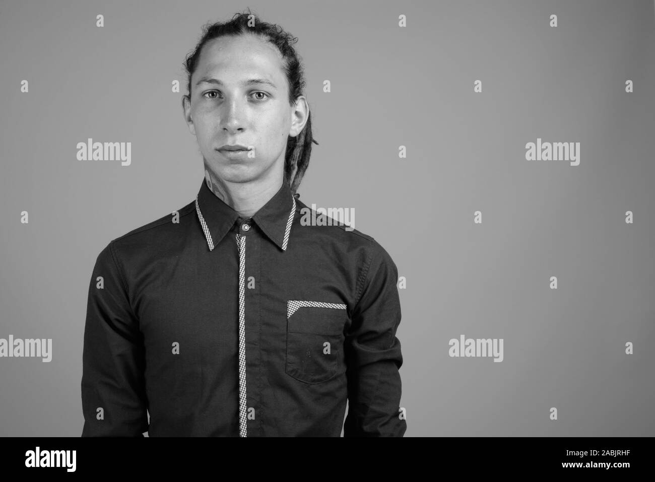 Young man with dreadlocks in black and white Stock Photo - Alamy