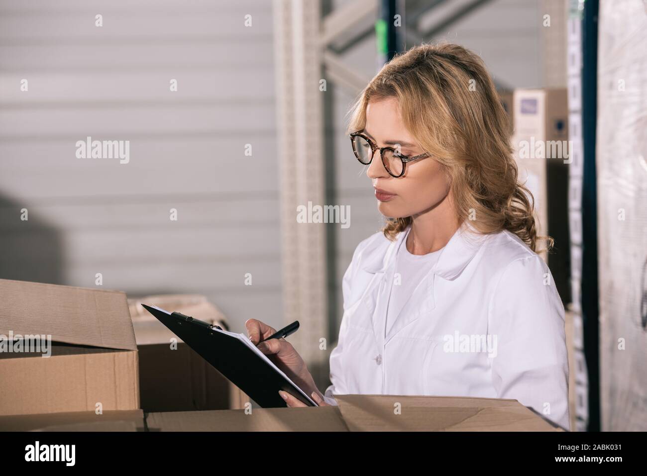 Concentrated storekeeper in white hi-res stock photography and images ...