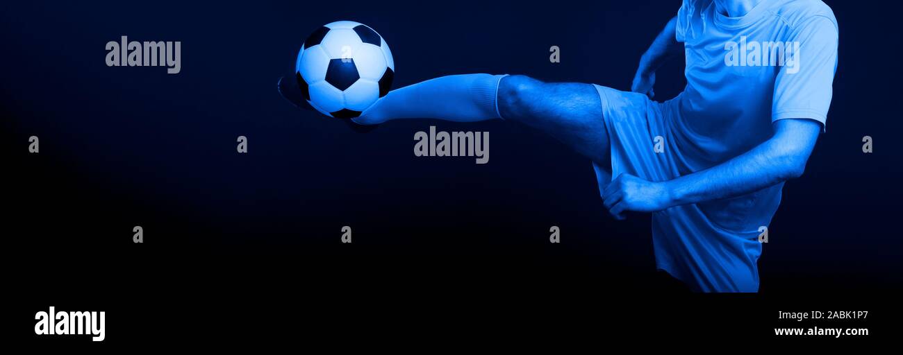 Close Up Legs And Soccer Shoe Of Football Player In Action Kicking Ball Isolated On Black Background Blue Filter Stock Photo Alamy Close Up Legs And Soccer Shoe Of Football Player In Action Kicking Ball Isolated On Black Background Blue Filter Stock Photo Alamy