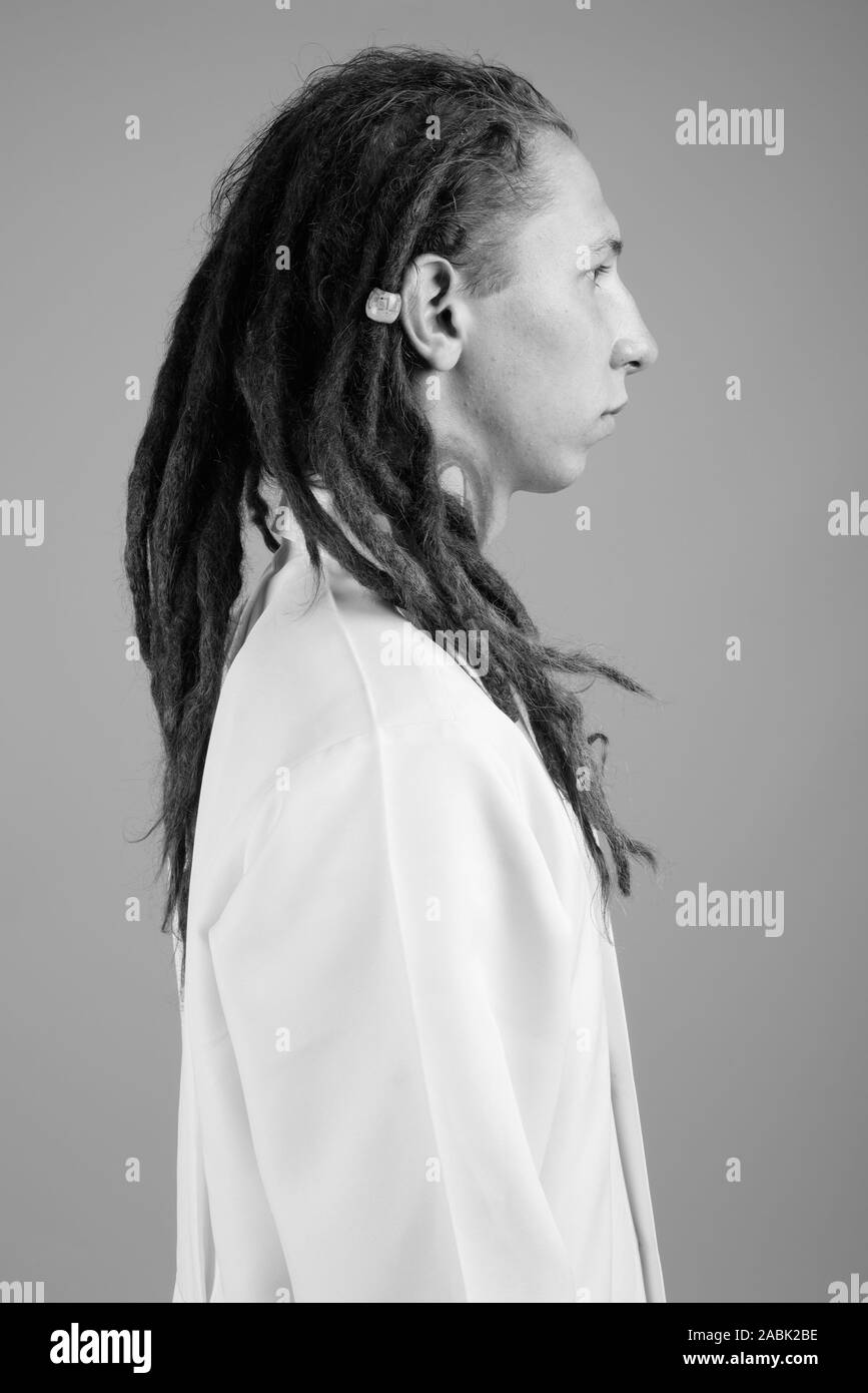 Young Man Doctor With Dreadlocks In Black And White Stock