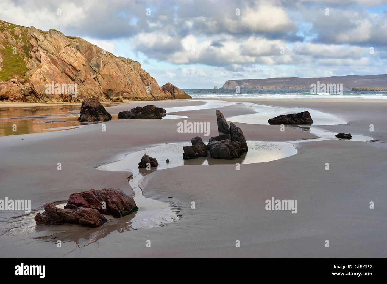 Rock pools on Traigh Allt Chailgeag beach, near Durness, Sutherland, Highland, Scotland Stock Photo