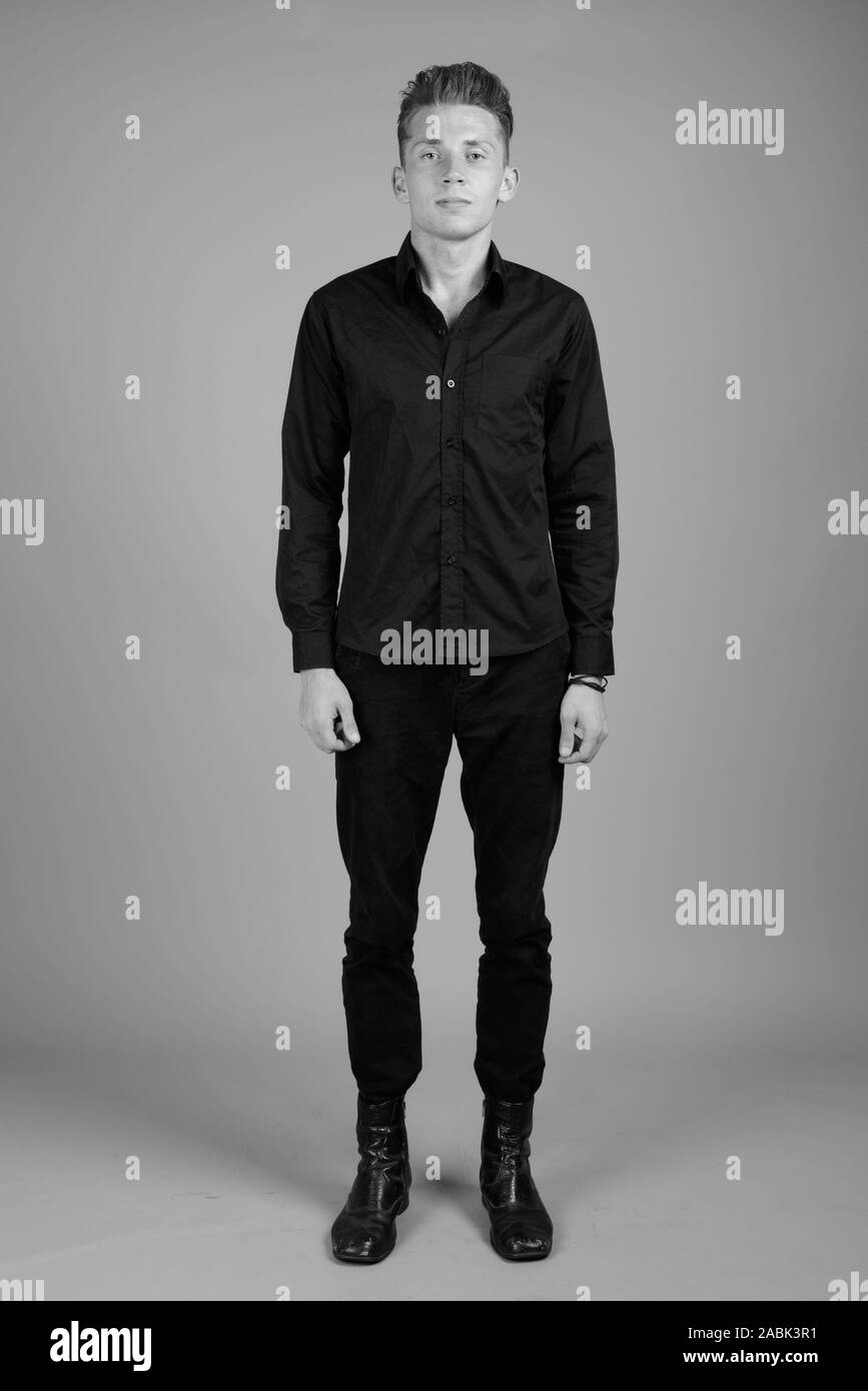 Portrait of young businessman in black and white Stock Photo - Alamy