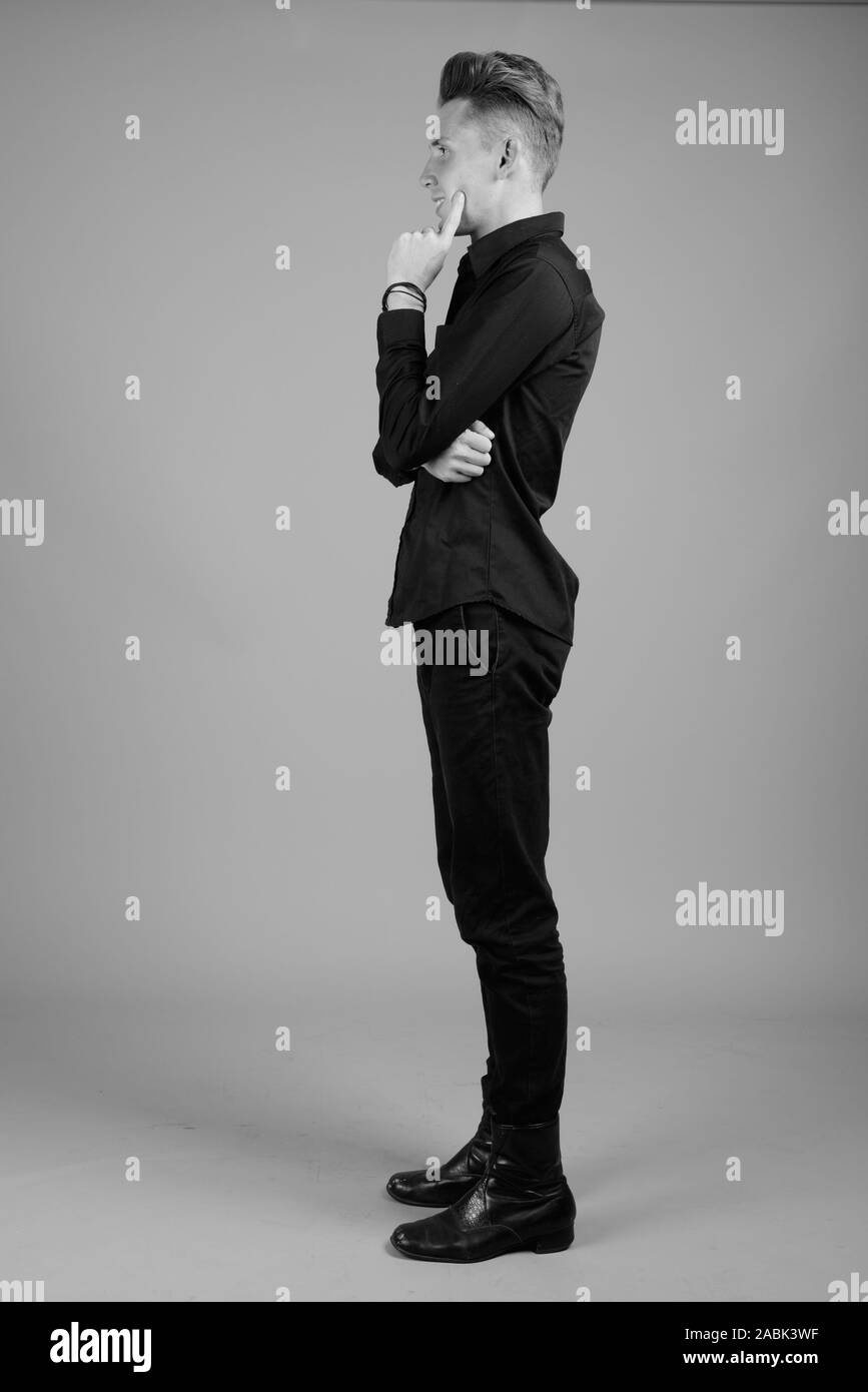 Portrait of young businessman in black and white Stock Photo - Alamy
