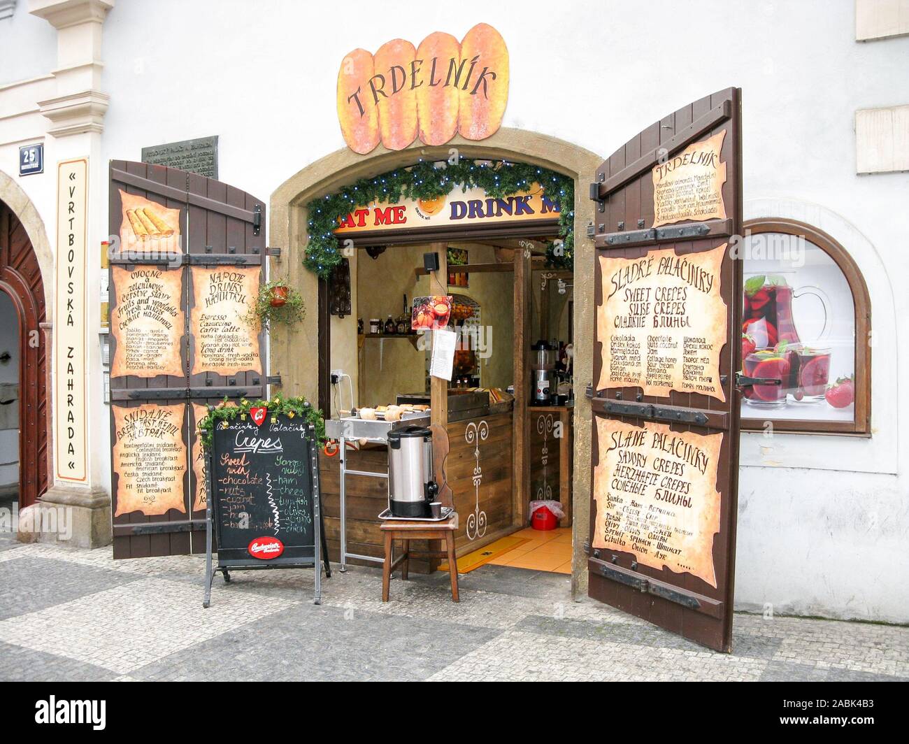 Front of shop and cafe selling sweets, snacks and drinks in Lesser Town near Vrtbovska Zahrada, Prague Stock Photo