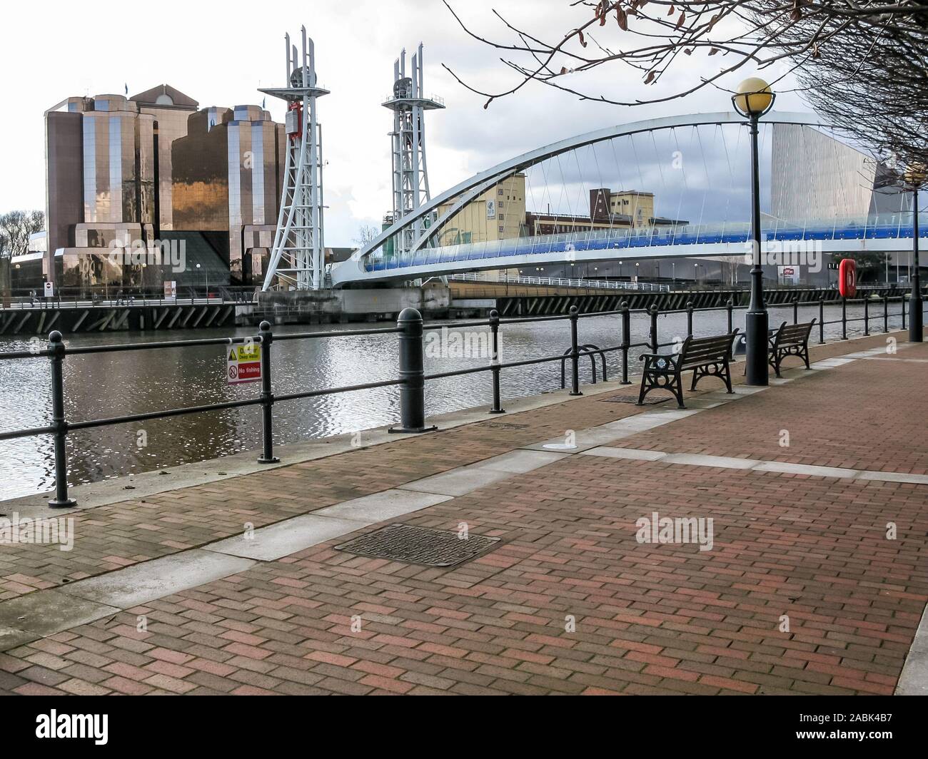 The Lowry bridge over Manchester Ship Canal and Quay West building, The Quays, Salford, Manchester, England, UK Stock Photo