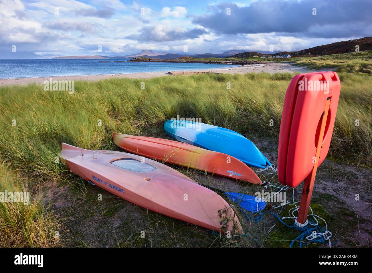 Kayaks in the dunes at Mellon Udrigle beach, Gruinard Bay, Wester Ross, Highland, Scotland Stock Photo