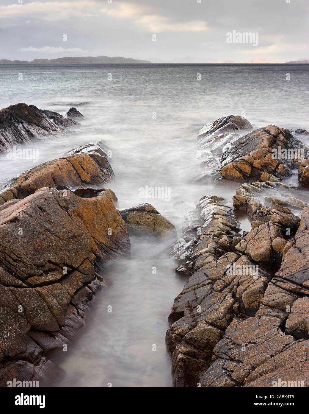 Rocks and incoming tide at Mellon Udrigle beach, Gruinard Bay, Wester Ross, Highland, Scotland Stock Photo