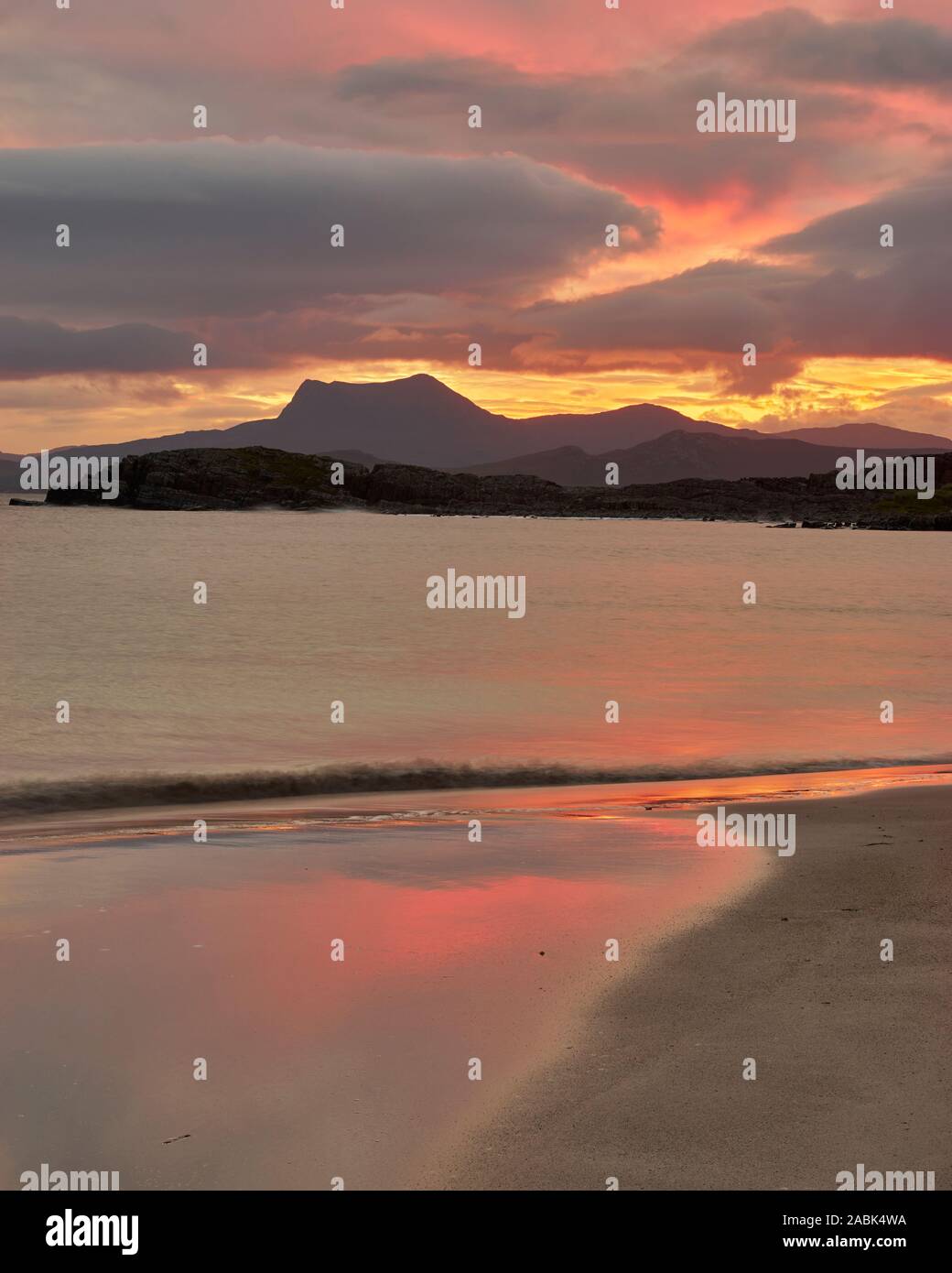 Sunrise at Mellon Udrigle beach, Gruinard Bay, Wester Ross, Highland, Scotland.  View to Beinn Ghobhlach over Gruinard Bay Stock Photo