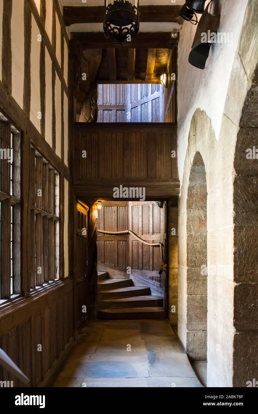 Gothic oak staircase, Leeds Castle, Maidstone, Kent, England. Bottom of the spiral staircase. Stock Photo