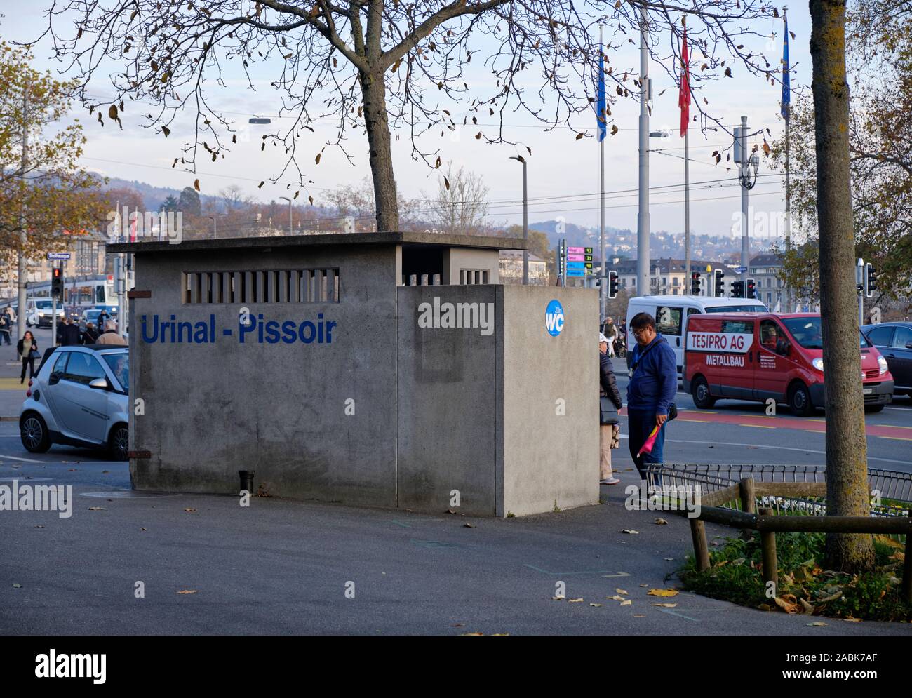 Public Urinal in urban park in Zurich, Switzerland, Stock Photo