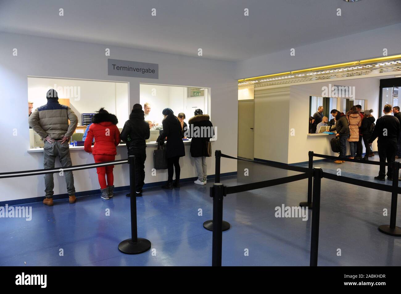 First day of the new online appointment procedure in the Munich district administration department (KVR). The newly designed waiting zone is divided into coloured areas (yellow, red, blue, green) which replace the old letter system. [automated translation] Stock Photo
