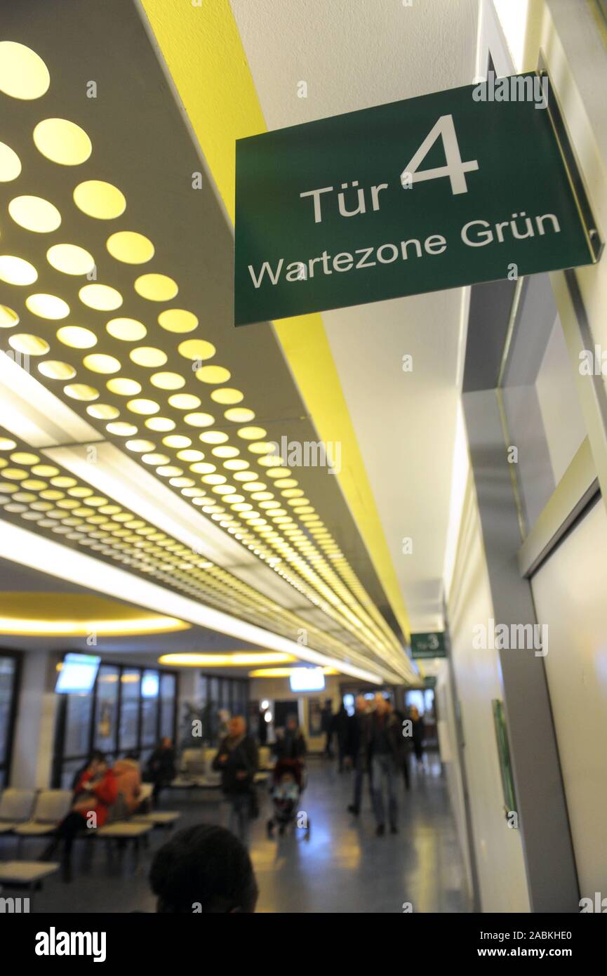 First day of the new online appointment procedure in the Munich district administration department (KVR). The newly designed waiting zone is divided into coloured areas (yellow, red, blue, green) which replace the old letter system. [automated translation] Stock Photo