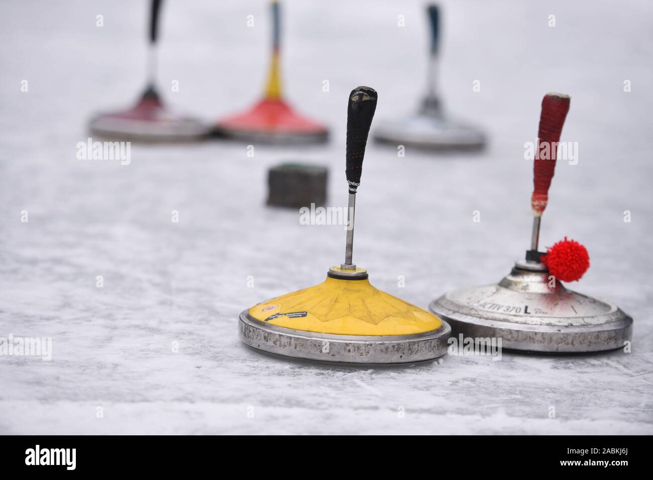 Winter sports enthusiast curling on the frozen Nymphenburg castle canal. [automated translation] Stock Photo
