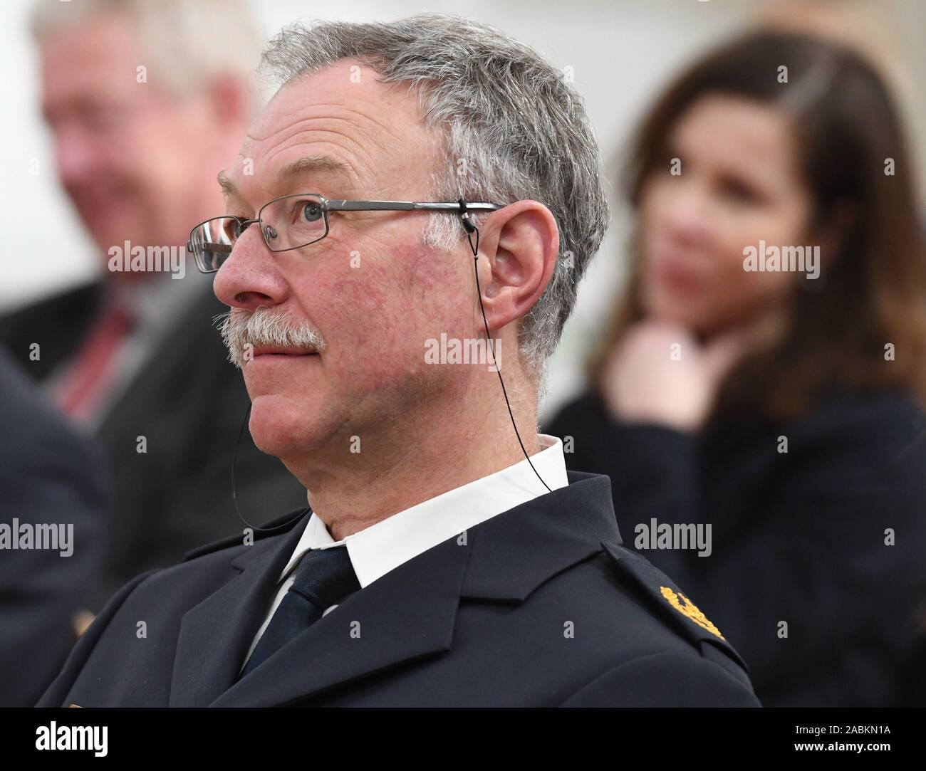 Police Vice President Werner Feiler listens to Interior Minister Joachim Herrmann's speech at his retirement ceremony. [automated translation] Stock Photo