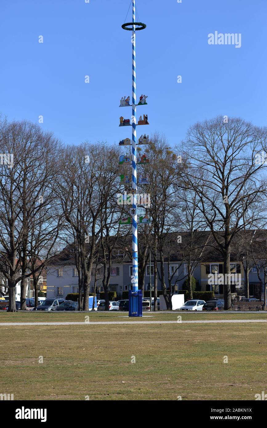Green area with maypole on the Luise-Kiesselbach-Platz in Sendling-Westpark. [automated translation] Stock Photo