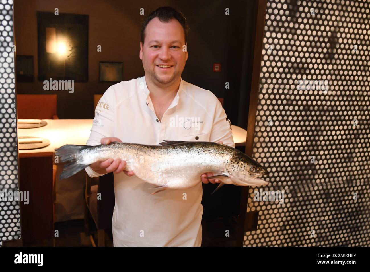 Jan Hartwig Chef At The Restaurant Atelier In The Bayerischer Hof In Munich Presents A Salmon For Ash Wednesday Automated Translation Stock Photo Alamy