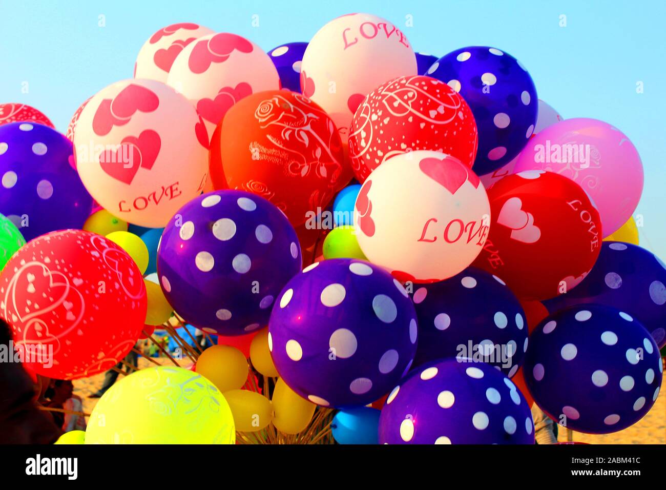 Children playing with balloons hi-res stock photography and images - Alamy