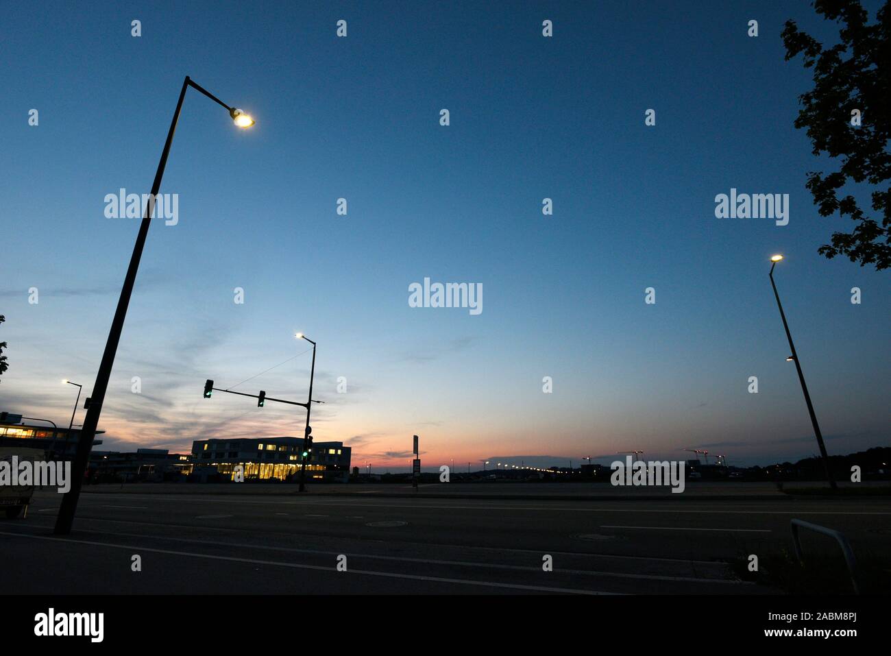 Street lighting at dawn in Munich-Freiham. [automated translation] Stock Photo