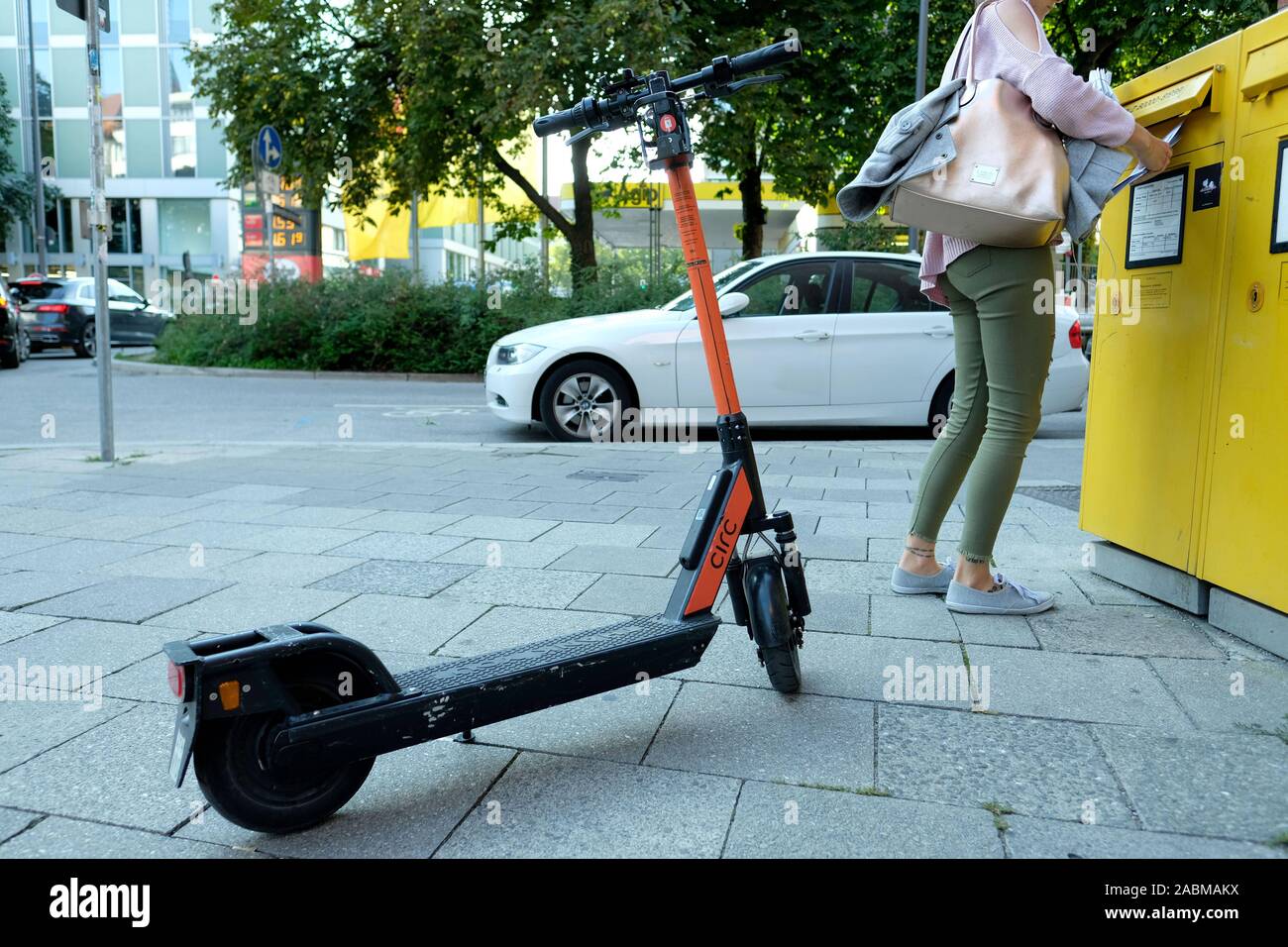 On a sidewalk parked electric scooter of the supplier Circ in Munich. [automated translation] Stock Photo