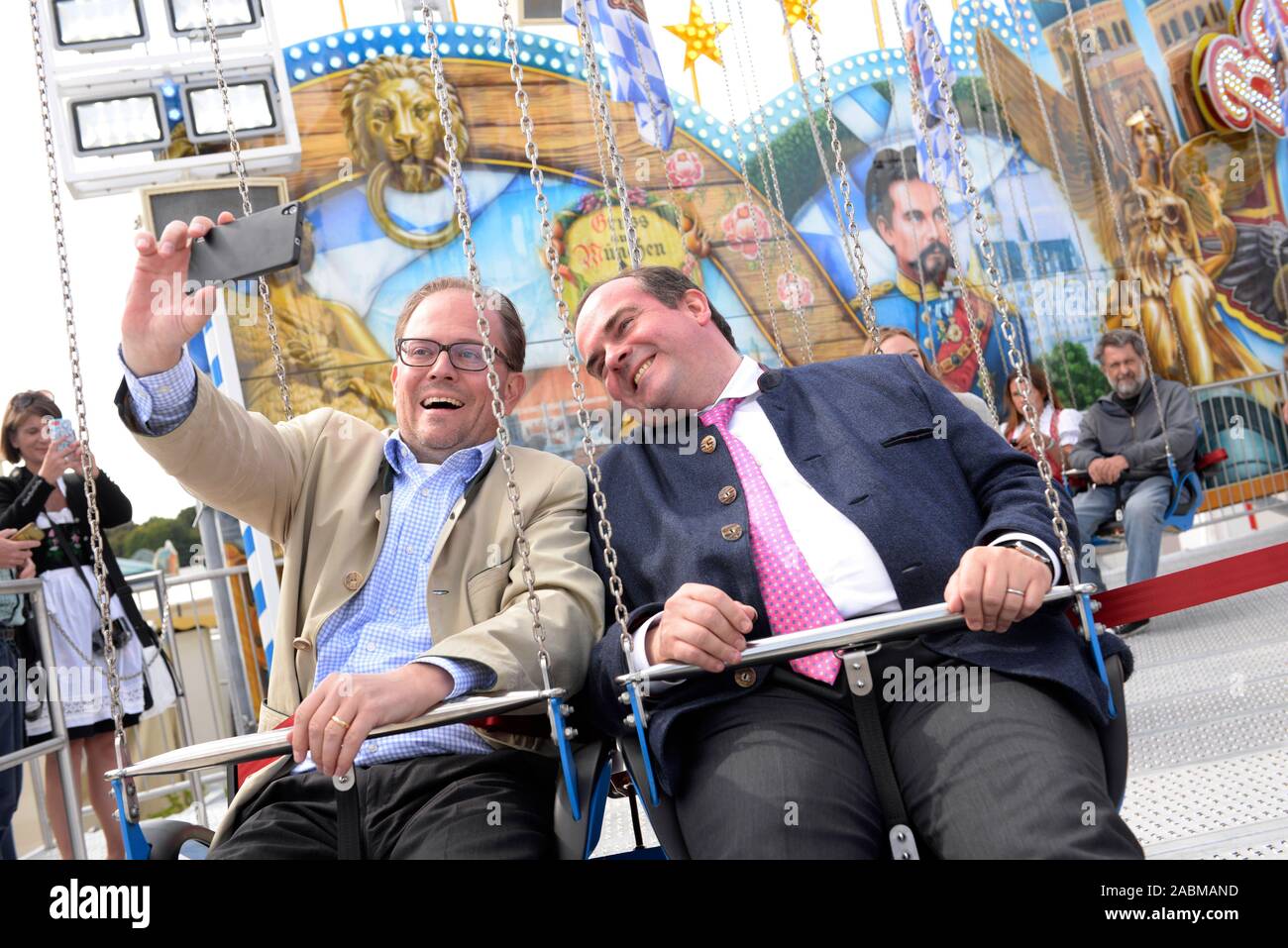 During the traditional press tour of the Oktoberfest site, the new rides and attractions will be presented in advance. In the picture mayor Manuel Pretzl (l.) and economic consultant and head of Wiesn Clemens Baumgärtner (both CSU) in the ride 'Bayern Tower'. [automated translation] Stock Photo