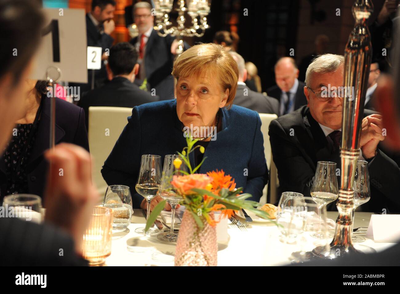 Chancellor Angela Merkel at the Night of the European Economy at the SZ Economic Summit in Berlin. To the right is Kurt Kister, editor-in-chief of the Süddeutsche Zeitung. [automated translation] Stock Photo