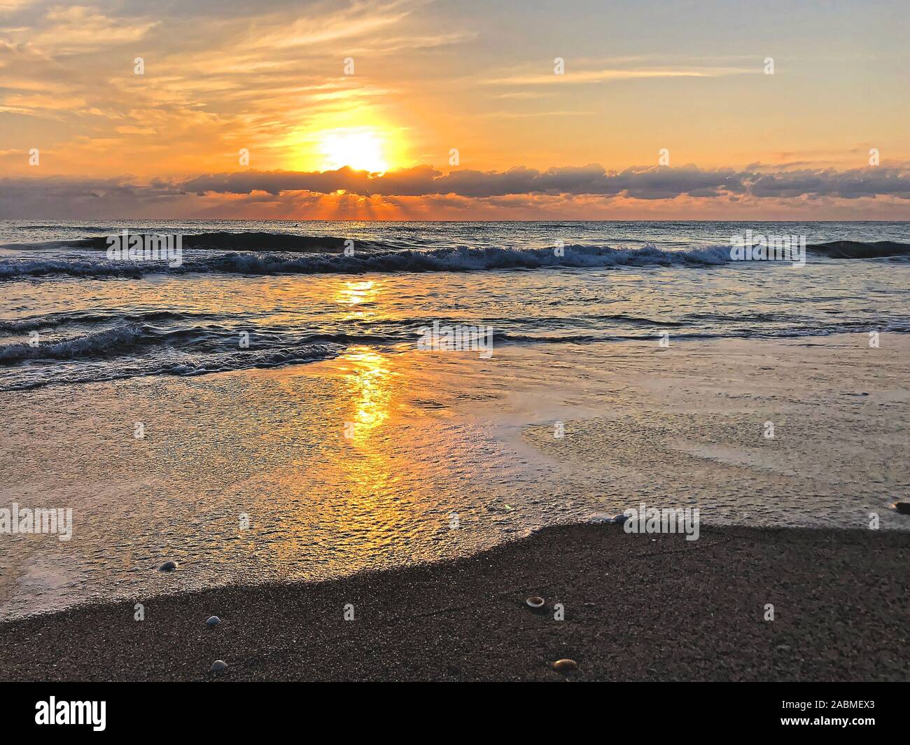 stormy sunrise on Florida beach during hurricane season Stock Photo