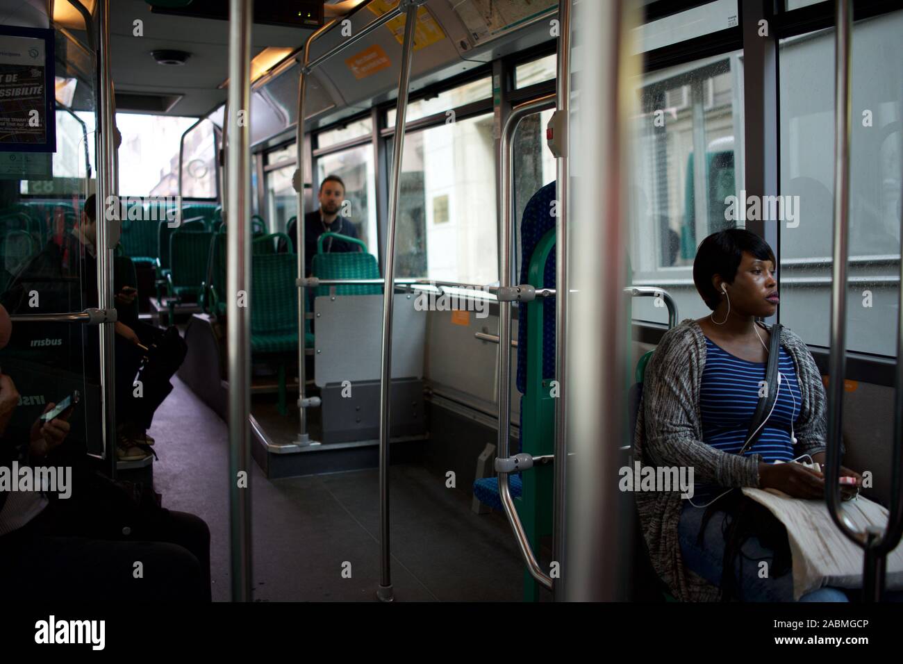 Bus passengers travelling, Paris, France Stock Photo